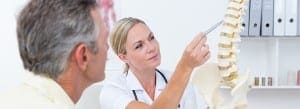 Doctor checking spine bone